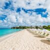 Row of White Beach Umbrellas